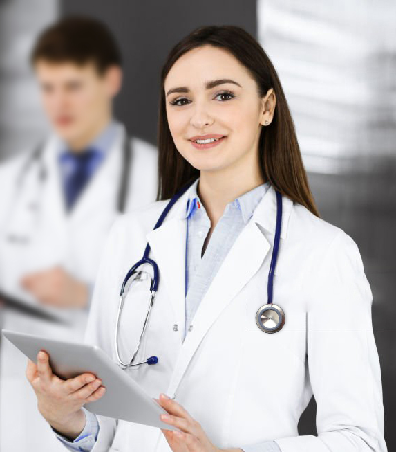 Detailed Services Image - A smiling lady doctor holding an iPad